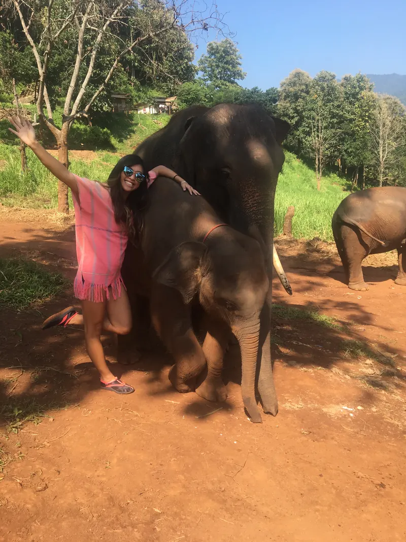 Vania with an elephant at an elephant sanctuary