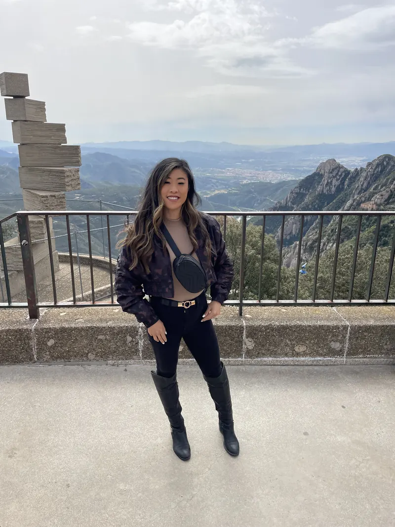 Vania at a mountain viewpoint in Montserrat, Spain